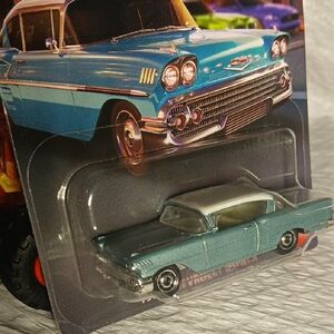 Chevrolet Classic Die-Cast Toy Car in Metallic Teal and White Matchbox